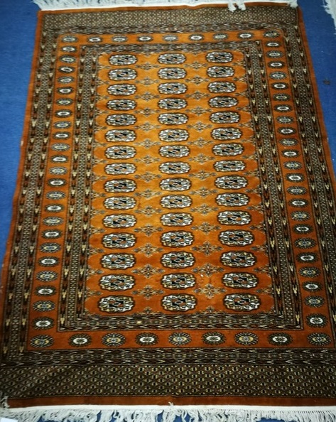 An Afghan rug 180cm x 120cm